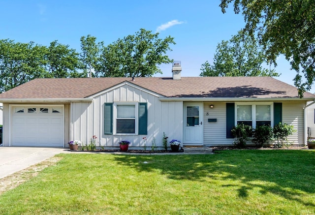 8 Emerald Ln, Huntington, IN 46750 - ranch-style house featuring board and batten siding, a chimney, concrete driveway, a front lawn, and an attached garage
