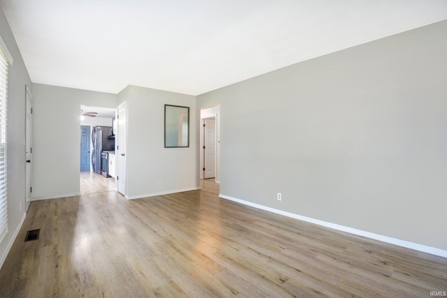 8 Emerald Ln, Huntington, IN 46750 - unfurnished room featuring light wood finished floors and baseboards