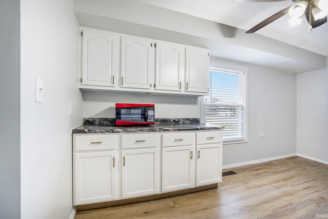 8 Emerald Ln, Huntington, IN 46750 - kitchen with white cabinetry, light wood finished floors, and a ceiling fan