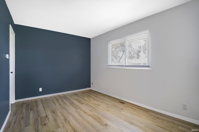 8 Emerald Ln, Huntington, IN 46750 - spare room featuring wood finished floors