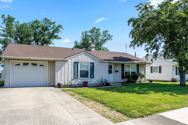 8 Emerald Ln, Huntington, IN 46750 - ranch-style home with board and batten siding, an attached garage, driveway, a front yard, and roof with shingles