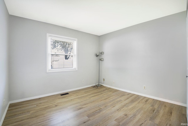 8 Emerald Ln, Huntington, IN 46750 - spare room with wood finished floors and baseboards