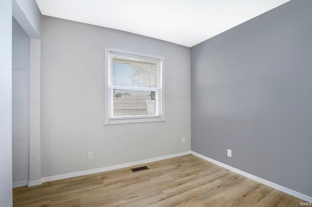 8 Emerald Ln, Huntington, IN 46750 - spare room with light wood-style flooring and baseboards