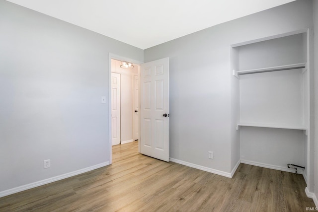 8 Emerald Ln, Huntington, IN 46750 - unfurnished bedroom with wood finished floors and baseboards