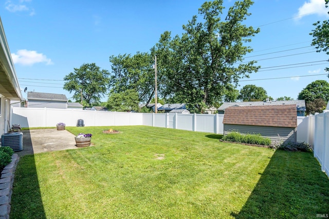 8 Emerald Ln, Huntington, IN 46750 - fenced backyard with a patio area and a shed