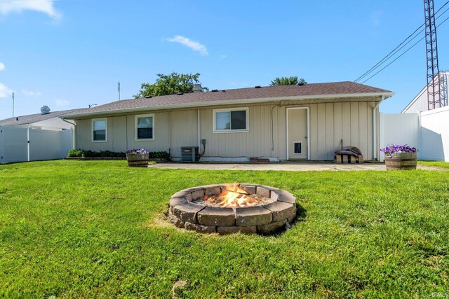 8 Emerald Ln, Huntington, IN 46750 - back of house featuring a fenced backyard, an outdoor fire pit, and a chimney