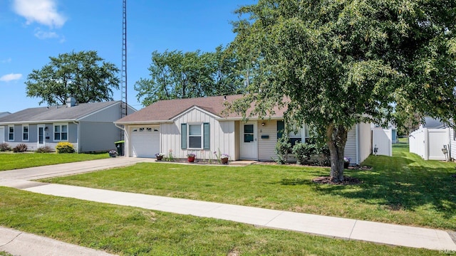 8 Emerald Ln, Huntington, IN 46750 - single story home featuring board and batten siding, an attached garage, driveway, and a front yard