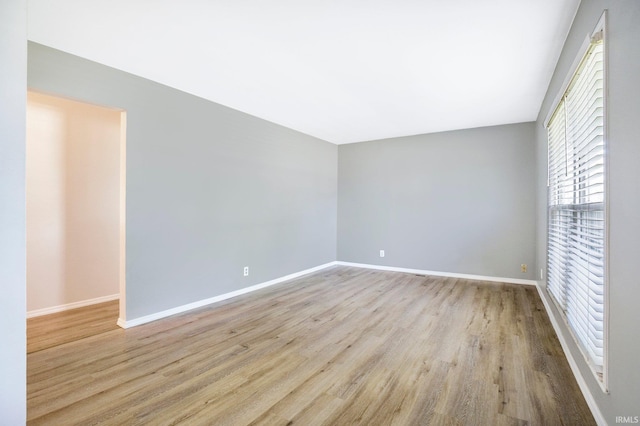 8 Emerald Ln, Huntington, IN 46750 - empty room with wood finished floors and baseboards