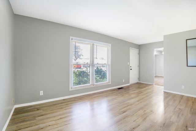 8 Emerald Ln, Huntington, IN 46750 - unfurnished room featuring light wood-style flooring and baseboards