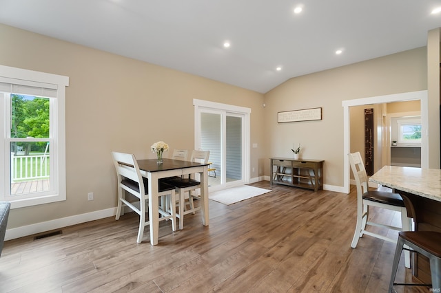 7316 Butt Rd, Fort Wayne, IN 46818 - dining area featuring wood finished floors, plenty of natural light, vaulted ceiling, and recessed lighting