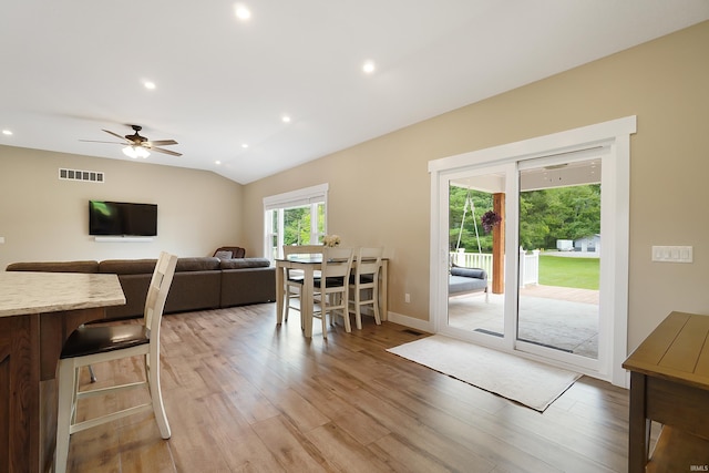 7316 Butt Rd, Fort Wayne, IN 46818 - dining area with light wood-style flooring, a ceiling fan, recessed lighting, and vaulted ceiling