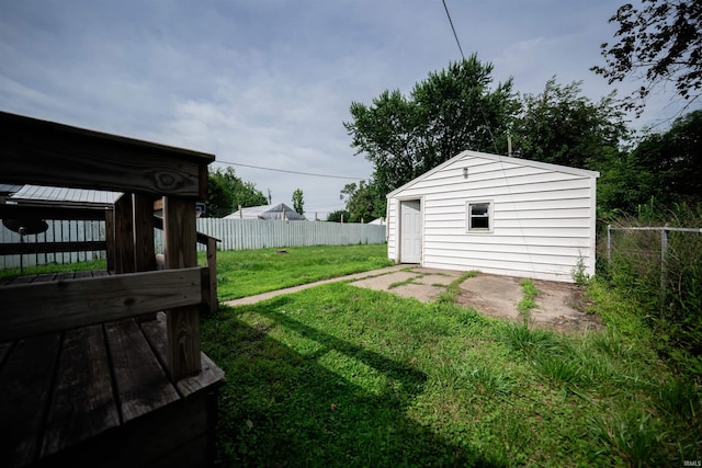 221 S Kenmore St, South Bend, IN 46619 - fenced backyard featuring an outbuilding