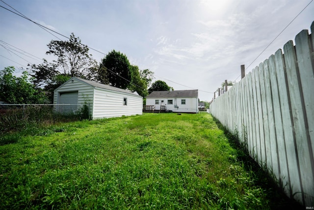 221 S Kenmore St, South Bend, IN 46619 - view of yard with an outbuilding and a garage