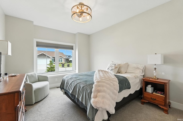 1381 Codorna Cv, Fort Wayne, IN 46804 - bedroom featuring light colored carpet and a chandelier
