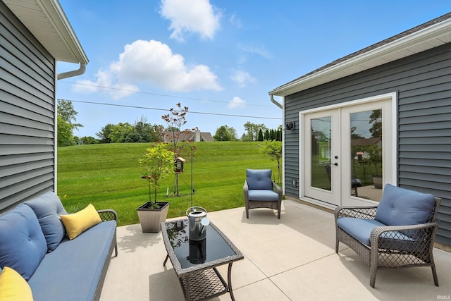1381 Codorna Cv, Fort Wayne, IN 46804 - view of patio with french doors and an outdoor hangout area