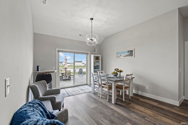 936 Switchfoot Dr, Huntertown, IN 46748 - dining area with a chandelier, wood finished floors, and lofted ceiling