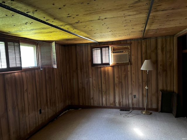 11592 E Main St, Owensburg, IN 47453 - empty room with plenty of natural light and wood walls