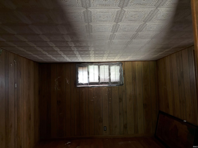 11592 E Main St, Owensburg, IN 47453 - unfurnished room featuring wooden walls and wood finished floors