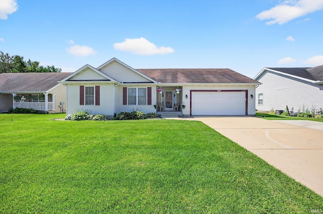 4310 Ashard Dr, South Bend, IN 46628 - ranch-style house with a garage, driveway, and a front yard