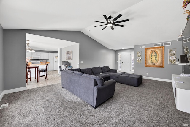4310 Ashard Dr, South Bend, IN 46628 - living area featuring carpet floors, a ceiling fan, and lofted ceiling