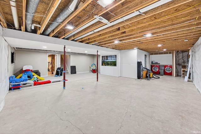 4310 Ashard Dr, South Bend, IN 46628 - unfinished basement with washing machine and clothes dryer