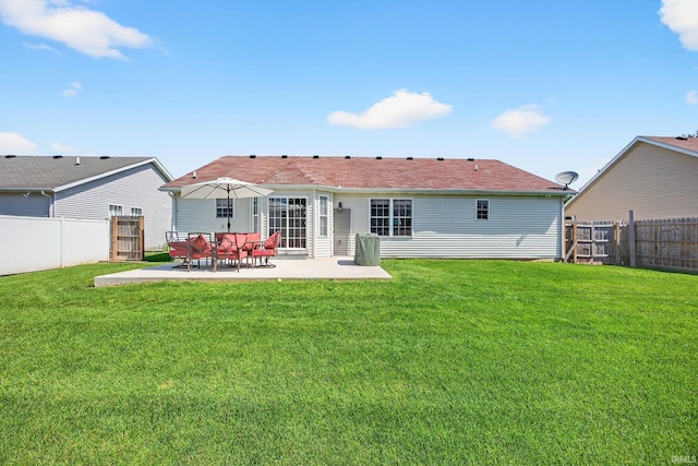 4310 Ashard Dr, South Bend, IN 46628 - rear view of property with a patio and a fenced backyard