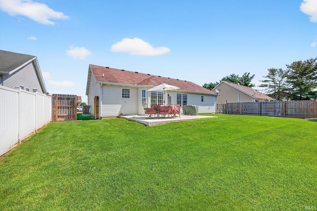 4310 Ashard Dr, South Bend, IN 46628 - rear view of property with a patio and a fenced backyard