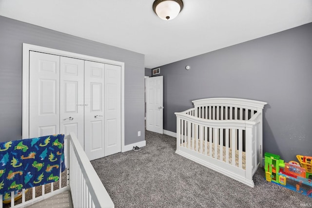 4310 Ashard Dr, South Bend, IN 46628 - carpeted bedroom with a closet and a nursery area