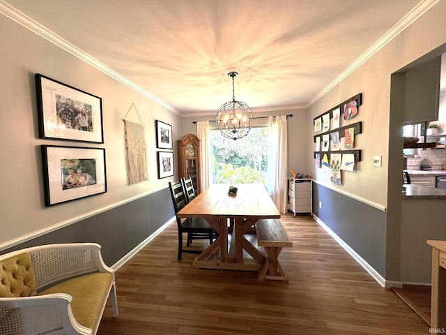 1896 N Michael Dr, Marion, IN 46952 - dining room featuring a chandelier, dark wood finished floors, and ornamental molding