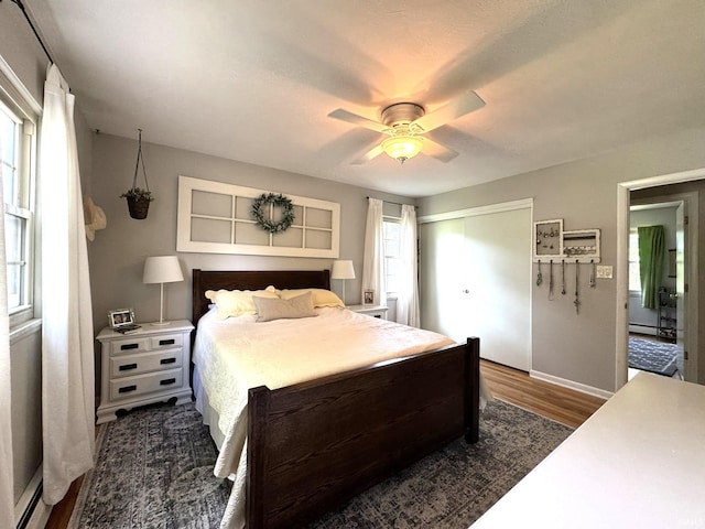 1896 N Michael Dr, Marion, IN 46952 - bedroom featuring dark wood finished floors, a closet, and ceiling fan