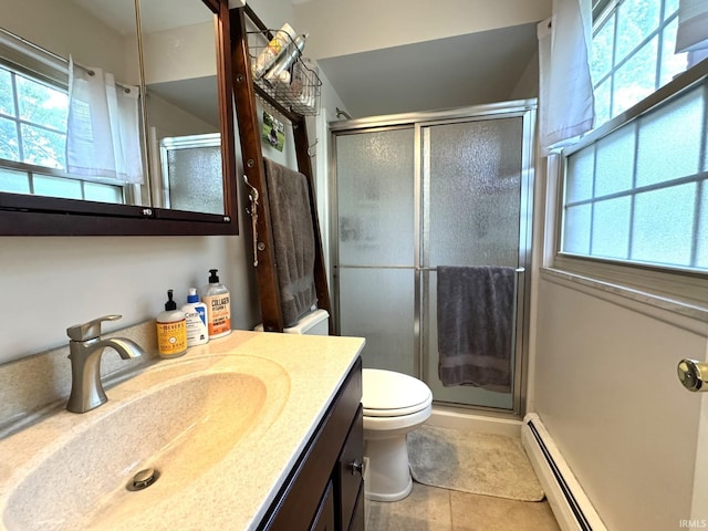 1896 N Michael Dr, Marion, IN 46952 - full bathroom with a baseboard heating unit, tile patterned floors, vanity, and healthy amount of natural light