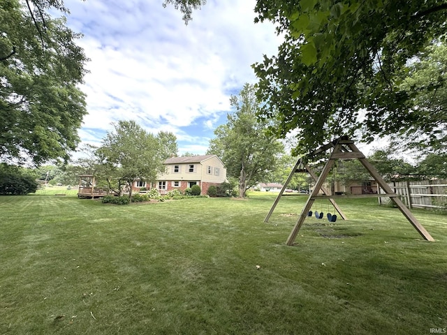 1896 N Michael Dr, Marion, IN 46952 - view of yard with a playground and a deck