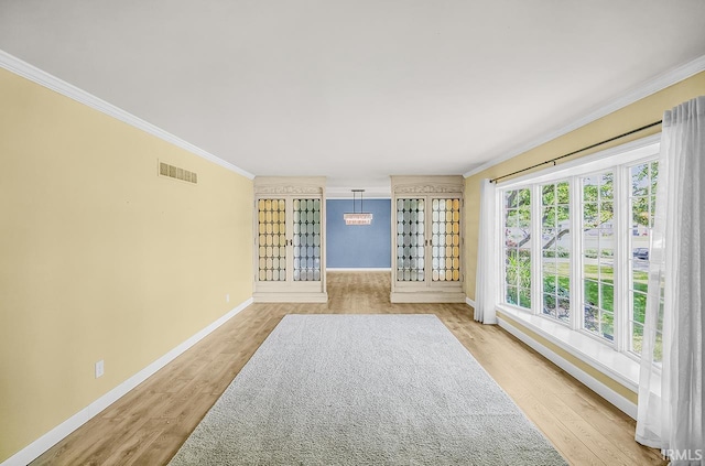 3111 N Eastlake Dr, Elkhart, IN 46514 - unfurnished living room featuring ornamental molding and wood finished floors