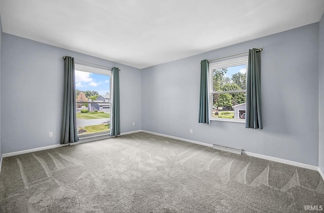 3111 N Eastlake Dr, Elkhart, IN 46514 - carpeted spare room featuring baseboards