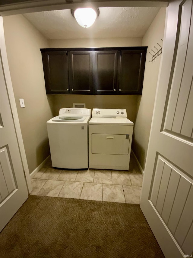 6243 S 700 W, West Point, IN 47992 - laundry room with cabinet space, washer and dryer, light carpet, and light tile patterned floors