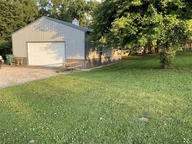 6243 S 700 W, West Point, IN 47992 - view of grassy yard with a detached garage and an outbuilding