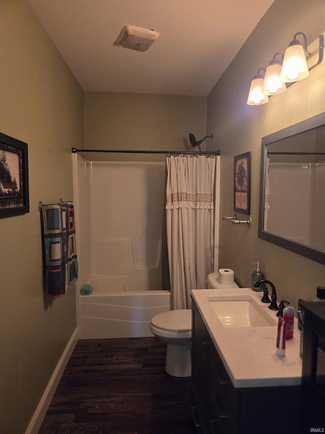 5811W Janssen Ln, Crawfordsville, IN 47933 - bathroom with wood finished floors, vanity, and shower / tub combo