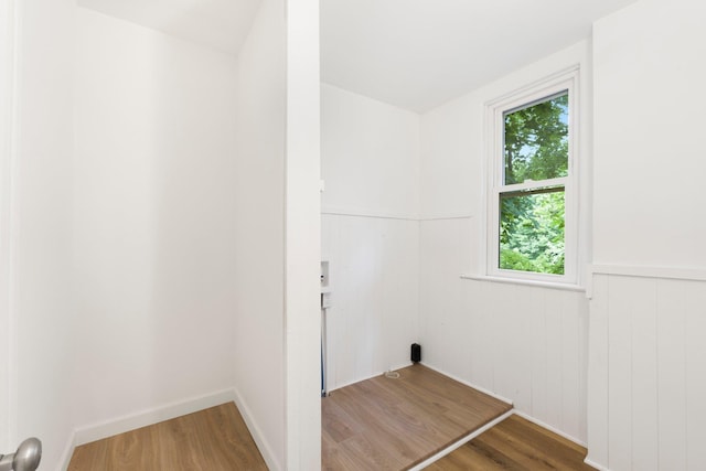 3222 Dinnen Ave, Fort Wayne, IN 46807 - laundry room with plenty of natural light, wood finished floors, and wainscoting