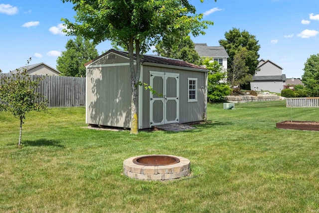 378 Buchanan St, West Lafayette, IN 47906 - view of shed featuring an outdoor fire pit