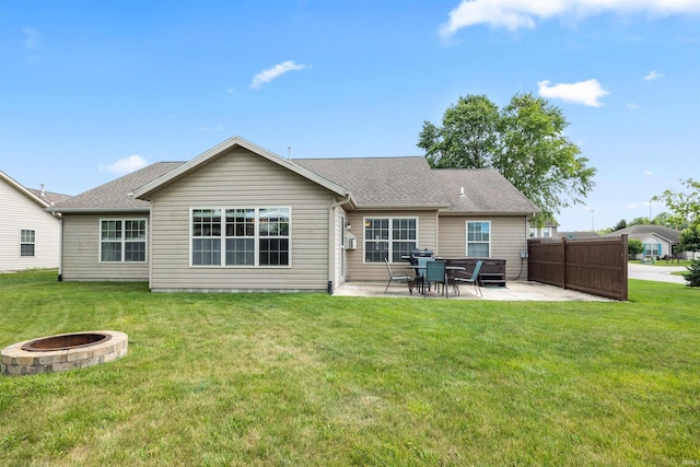 378 Buchanan St, West Lafayette, IN 47906 - rear view of house featuring an outdoor fire pit, a patio area, a yard, and a shingled roof