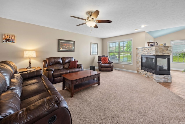 378 Buchanan St, West Lafayette, IN 47906 - living room with plenty of natural light, a ceiling fan, a fireplace, and carpet