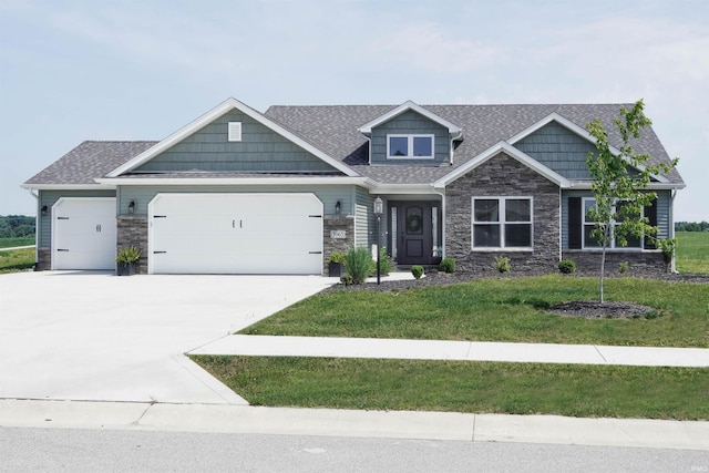3065 E Butler Ct, Columbia City, IN 46725 - craftsman inspired home featuring stone siding, a garage, a front lawn, and driveway