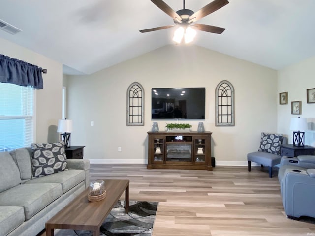 3065 E Butler Ct, Columbia City, IN 46725 - living area featuring light wood-style floors, a ceiling fan, and vaulted ceiling