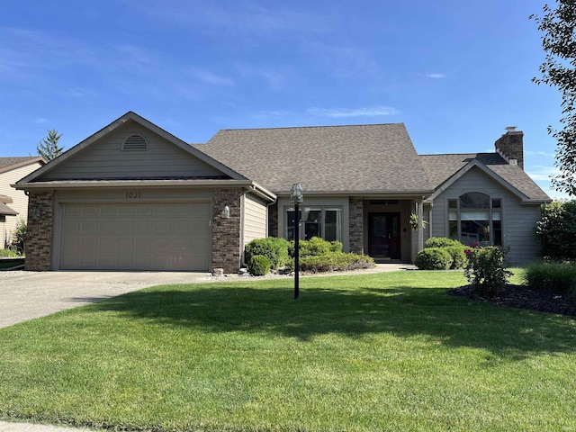 1031 Skyline Pass, Fort Wayne, IN 46825 - view of front of property featuring a chimney, a front yard, driveway, an attached garage, and a shingled roof