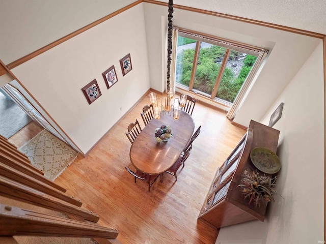 1031 Skyline Pass, Fort Wayne, IN 46825 - dining area with wood finished floors and ornamental molding