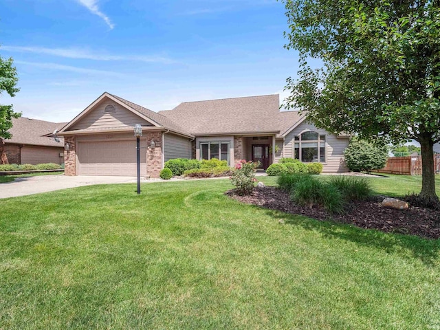 1031 Skyline Pass, Fort Wayne, IN 46825 - single story home featuring a garage, concrete driveway, brick siding, and roof with shingles