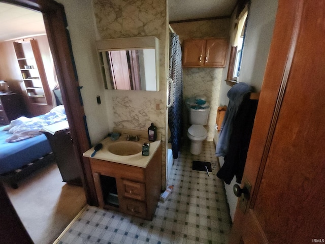 1110 Cummings St, Logansport, IN 46947 - full bathroom with vanity, a shower with shower curtain, and tile patterned floors