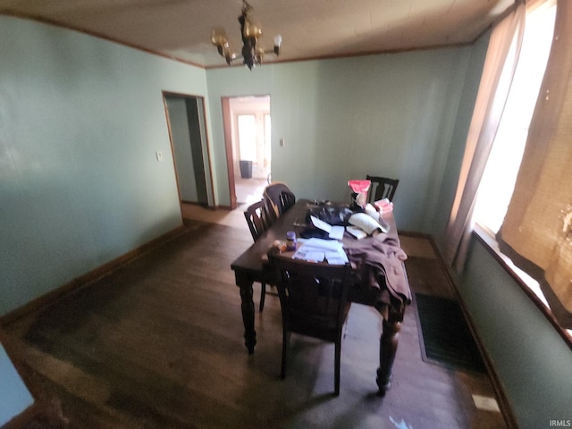 1110 Cummings St, Logansport, IN 46947 - dining area with a chandelier and baseboards