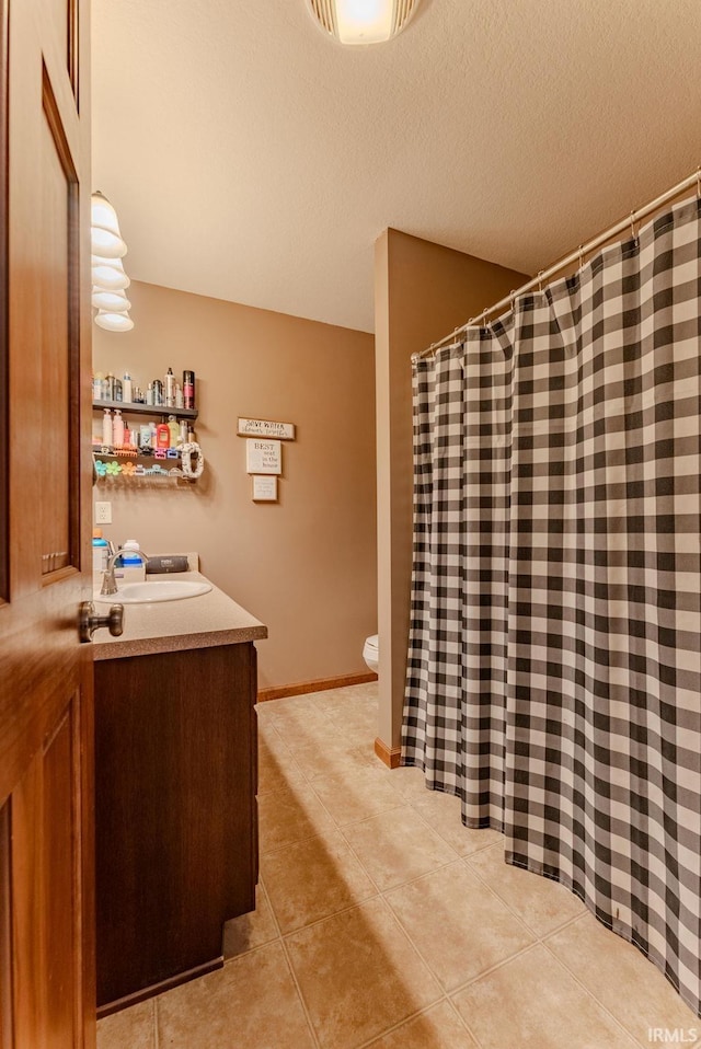 12 Chrysler Ave, Wabash, IN 46992 - bathroom with vanity, tile patterned floors, a shower with shower curtain, and a textured ceiling