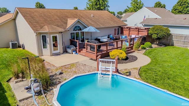 12 Chrysler Ave, Wabash, IN 46992 - back of house featuring an outdoor hangout area, a wooden deck, an outdoor pool, a fenced backyard, and a shingled roof